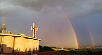 Arcobaleno su Collevalenza per un futuro di speranza.
